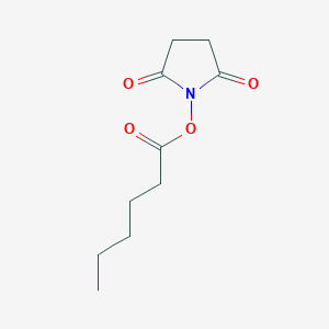 molecular formula C10H15NO4 B134288 N-(Hexanoyloxy)succinimide CAS No. 22102-92-7