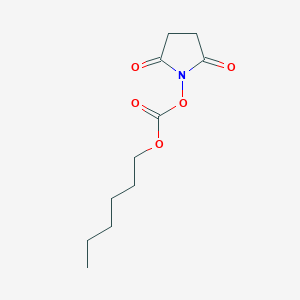 molecular formula C11H17NO5 B13439561 2,5-Dioxopyrrolidin-1-yl hexyl Carbonate 