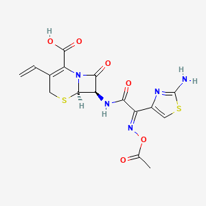 molecular formula C16H15N5O6S2 B13441310 O-Acetyl Cefdinir 