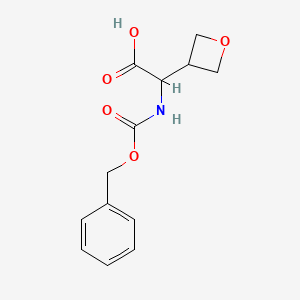 molecular formula C13H15NO5 B13441659 2-(((Benzyloxy)carbonyl)amino)-2-(oxetan-3-yl)acetic acid CAS No. 1260642-83-8