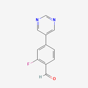 molecular formula C11H7FN2O B1344659 2-Fluoro-4-(pyrimidin-5-yl)benzaldehyde 