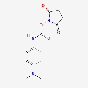 molecular formula C13H15N3O4 B13448044 2,5-dioxopyrrolidin-1-yl N-[4-(dimethylamino)phenyl]carbamate 