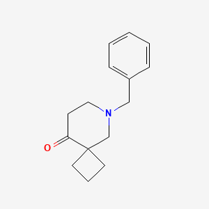 molecular formula C15H19NO B13455743 6-Benzyl-6-azaspiro[3.5]nonan-9-one 