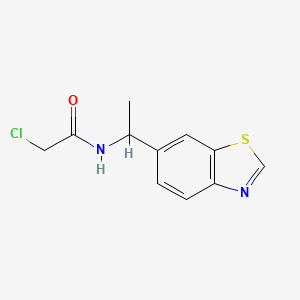 molecular formula C11H11ClN2OS B13460197 N-[1-(1,3-benzothiazol-6-yl)ethyl]-2-chloroacetamide 
