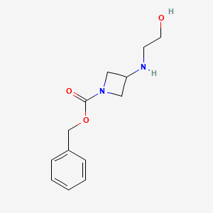 molecular formula C13H18N2O3 B13460358 Benzyl 3-((2-hydroxyethyl)amino)azetidine-1-carboxylate 