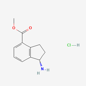 molecular formula C11H14ClNO2 B13461189 Methyl (1S)-1-amino-2,3-dihydro-1H-indene-4-carboxylate hydrochloride 