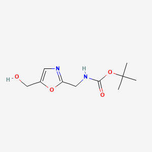 molecular formula C10H16N2O4 B13465092 tert-butyl N-{[5-(hydroxymethyl)-1,3-oxazol-2-yl]methyl}carbamate 