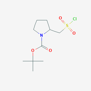 molecular formula C10H18ClNO4S B13466575 Tert-butyl 2-[(chlorosulfonyl)methyl]pyrrolidine-1-carboxylate 
