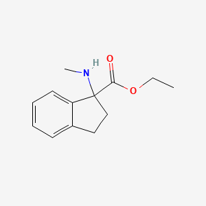 molecular formula C13H17NO2 B13475401 Ethyl 1-(methylamino)-2,3-dihydro-1h-indene-1-carboxylate 