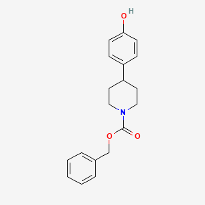 molecular formula C19H21NO3 B13491628 Benzyl 4-(4-hydroxyphenyl)piperidine-1-carboxylate 