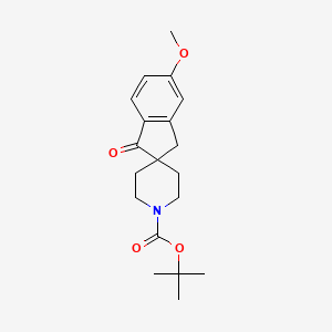 molecular formula C19H25NO4 B13493709 tert-Butyl 5-methoxy-1-oxo-1,3-dihydrospiro[indene-2,4'-piperidine]-1'-carboxylate 