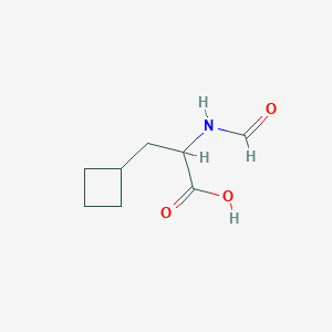 molecular formula C8H13NO3 B13495116 3-Cyclobutyl-2-formamidopropanoic acid 