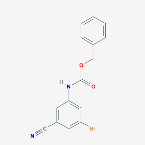 molecular formula C15H11BrN2O2 B13497592 Benzyl 3-bromo-5-cyanophenylcarbamate 