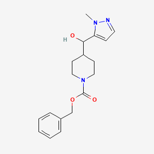 molecular formula C18H23N3O3 B13500124 Benzyl 4-(hydroxy(1-methyl-1H-pyrazol-5-yl)methyl)piperidine-1-carboxylate 