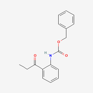molecular formula C17H17NO3 B13501340 benzyl N-(2-propanoylphenyl)carbamate 
