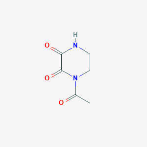 molecular formula C6H8N2O3 B135017 1-Acetylpiperazine-2,3-dione CAS No. 132269-98-8