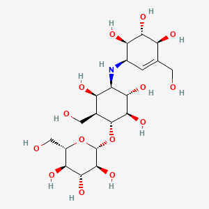 molecular formula C20H35NO14 B1352391 2-(Hydroxymethyl)-6-{[2,3,5-trihydroxy-6-(hydroxymethyl)-4-{[4,5,6-trihydroxy-3-(hydroxymethyl)cyclohex-2-en-1-yl]amino}cyclohexyl]oxy}oxane-3,4,5-triol CAS No. 102583-47-1