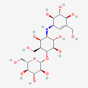 B1352391 (2S,3R,4R,5S,6S)-2-(hydroxymethyl)-6-[(1R,2R,3S,4R,5R,6S)-2,3,5-trihydroxy-6-(hydroxymethyl)-4-[[(1R,4S,5R,6R)-4,5,6-trihydroxy-3-(hydroxymethyl)cyclohex-2-en-1-yl]amino]cyclohexyl]oxyoxane-3,4,5-triol CAS No. 102583-47-1