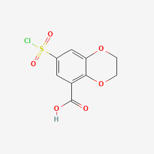 molecular formula C9H7ClO6S B1352687 7-(Chlorosulphonyl)-2,3-dihydro-1,4-benzodioxin-5-carboxylic acid CAS No. 66410-36-4
