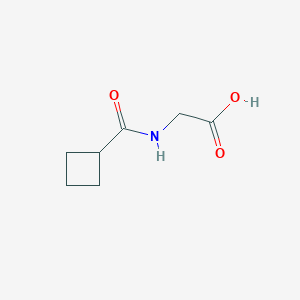 molecular formula C7H11NO3 B1354025 2-[(Cyclobutylcarbonyl)amino]acetic acid CAS No. 604790-72-9