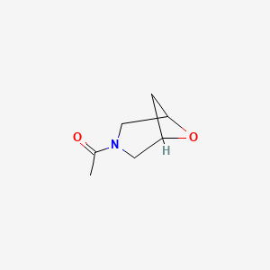 molecular formula C7H11NO2 B13543334 1-{6-Oxa-3-azabicyclo[3.1.1]heptan-3-yl}ethan-1-one 
