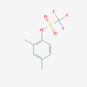 molecular formula C9H9F3O3S B1354373 Methanesulfonic acid, trifluoro-, 2,4-dimethylphenyl ester CAS No. 87241-52-9