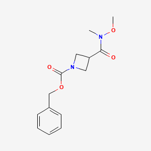 molecular formula C14H18N2O4 B13545109 Benzyl 3-[methoxy(methyl)carbamoyl]azetidine-1-carboxylate 