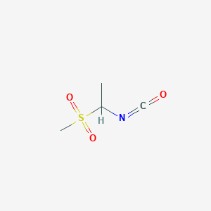molecular formula C4H7NO3S B13546476 1-Isocyanato-1-methanesulfonylethane 