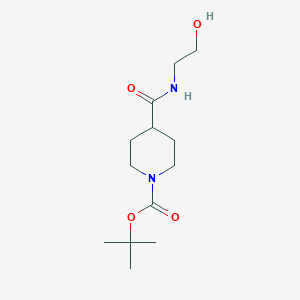 molecular formula C13H24N2O4 B13551015 Tert-butyl 4-((2-hydroxyethyl)carbamoyl)piperidine-1-carboxylate 