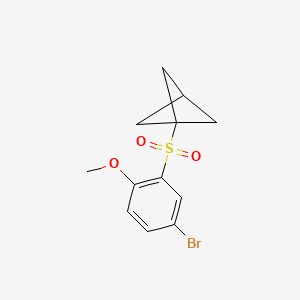 molecular formula C12H13BrO3S B13551351 1-(5-Bromo-2-methoxybenzenesulfonyl)bicyclo[1.1.1]pentane 