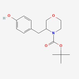 molecular formula C16H23NO4 B13551842 Tert-butyl 3-(4-hydroxybenzyl)morpholine-4-carboxylate 