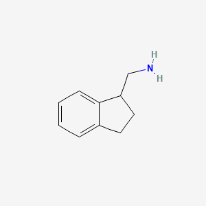 molecular formula C10H13N B1355519 (2,3-dihydro-1H-inden-1-yl)methanamine CAS No. 54949-92-7