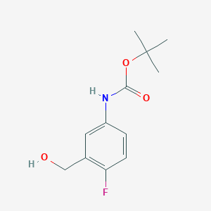 molecular formula C12H16FNO3 B13566039 tert-butyl N-[4-fluoro-3-(hydroxymethyl)phenyl]carbamate 