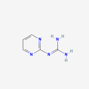 molecular formula C5H7N5 B1357122 1-(Pyrimidin-2-yl)guanidine CAS No. 90585-97-0