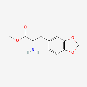 molecular formula C11H13NO4 B13574856 Methyl 2-amino-3-(1,3-dioxaindan-5-yl)propanoate 
