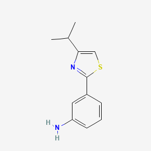 molecular formula C12H14N2S B13574932 3-(4-Isopropylthiazol-2-yl)aniline 