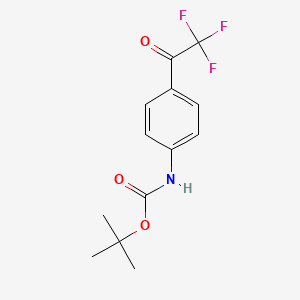 molecular formula C13H14F3NO3 B13575577 tert-butyl N-[4-(trifluoroacetyl)phenyl]carbamate 