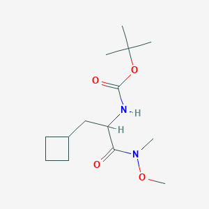 molecular formula C14H26N2O4 B135809 Tert-butyl (3-cyclobutyl-1-(methoxy(methyl)amino)-1-oxopropan-2-YL)carbamate CAS No. 394735-18-3