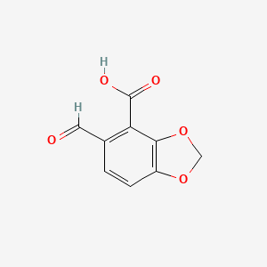 molecular formula C9H6O5 B13581583 5-Formyl-benzo[1,3]dioxole-4-carboxylic acid CAS No. 58343-48-9