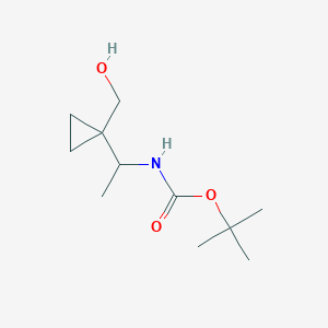 molecular formula C11H21NO3 B13581745 tert-butylN-{1-[1-(hydroxymethyl)cyclopropyl]ethyl}carbamate 