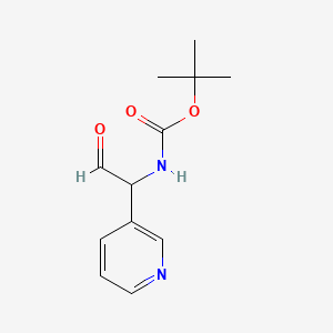 molecular formula C12H16N2O3 B13583952 tert-Butyl (2-oxo-1-(pyridin-3-yl)ethyl)carbamate 