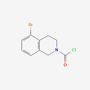 molecular formula C10H9BrClNO B13584631 5-Bromo-1,2,3,4-tetrahydroisoquinoline-2-carbonylchloride 