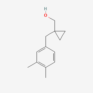 molecular formula C13H18O B13589325 (1-(3,4-Dimethylbenzyl)cyclopropyl)methanol 