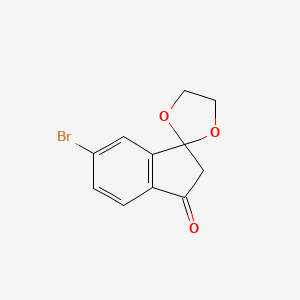 molecular formula C11H9BrO3 B13592084 6'-Bromo-2',3'-dihydrospiro[1,3-dioxolane-2,1'-inden]-3'-one 
