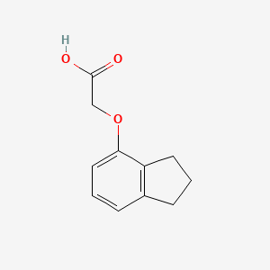 molecular formula C11H12O3 B13599010 Acetic acid, (4-indanyloxy)- CAS No. 25177-86-0