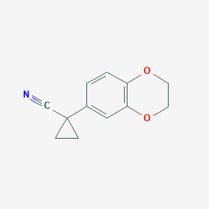 molecular formula C12H11NO2 B13602626 1-(2,3-Dihydrobenzo[b][1,4]dioxin-6-yl)cyclopropane-1-carbonitrile 