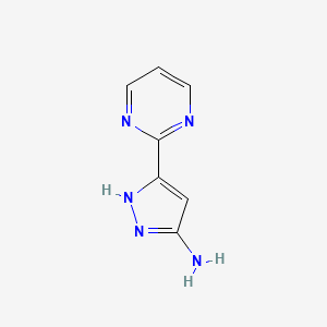 molecular formula C7H7N5 B13634326 5-(pyrimidin-2-yl)-1H-pyrazol-3-amine 