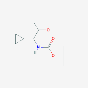 molecular formula C11H19NO3 B13644014 tert-butyl N-(1-cyclopropyl-2-oxopropyl)carbamate 
