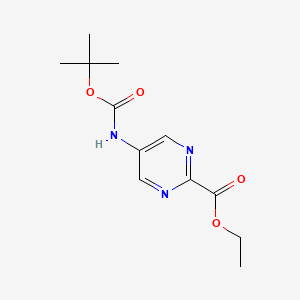 molecular formula C12H17N3O4 B13648307 Ethyl 5-((tert-butoxycarbonyl)amino)pyrimidine-2-carboxylate 