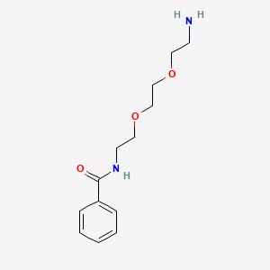 B1365250 N-(2-(2-(2-aminoethoxy)ethoxy)ethyl)benzamide CAS No. 923567-96-8